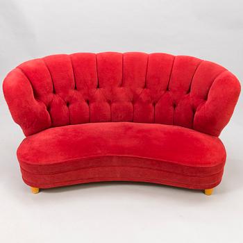 A mid-20th century sofa.