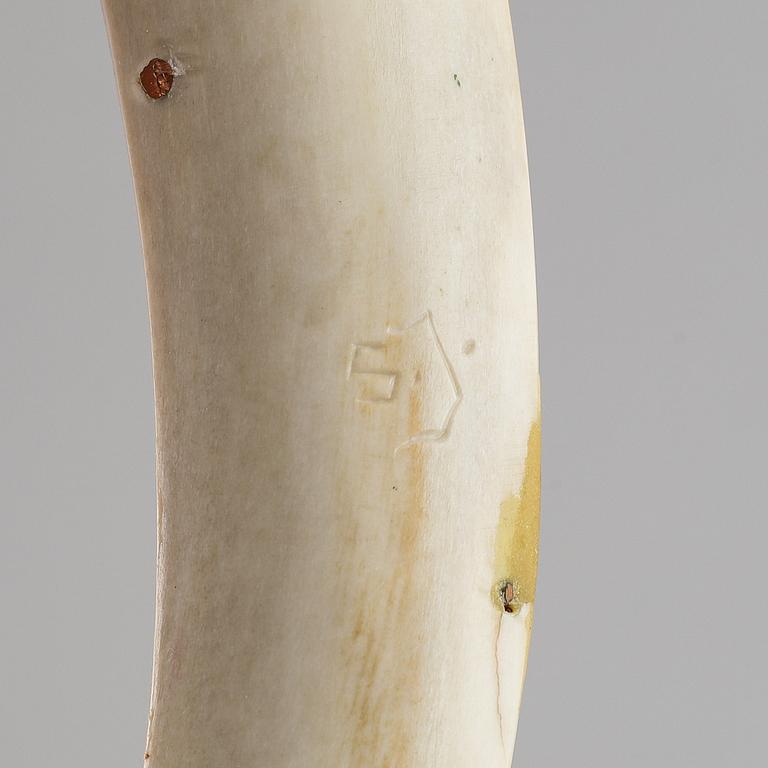 A reindeer horn Sami knife, signed SJ.