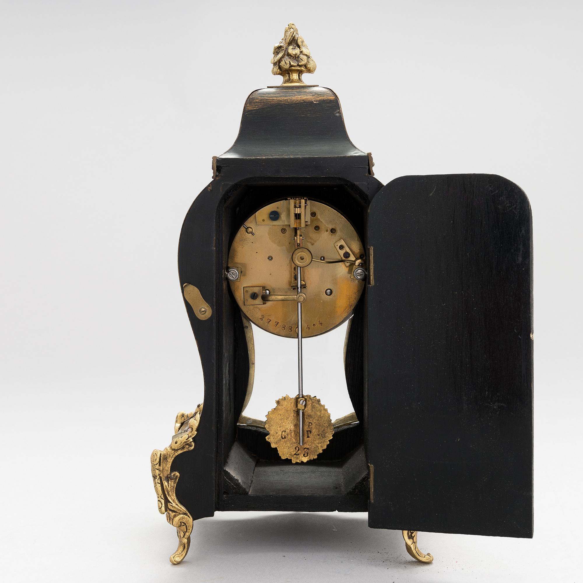 A French boulle style mantel clock, late 19th Century.