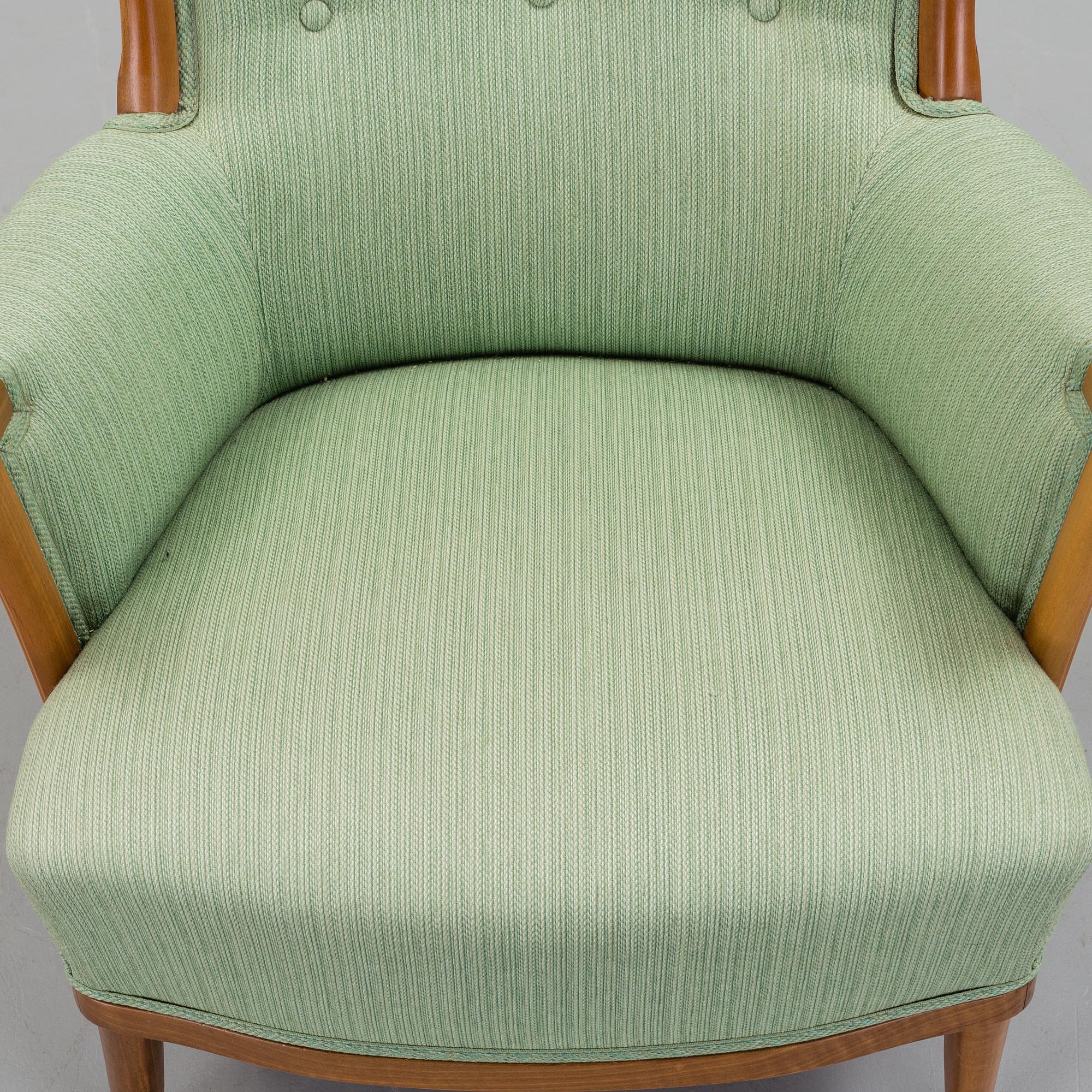 a Carl Malmsten "Vår Fru" armchair from the second half of the 20th century.