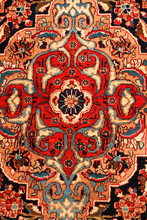 A Kashmar rug, 385 x 290 cm.