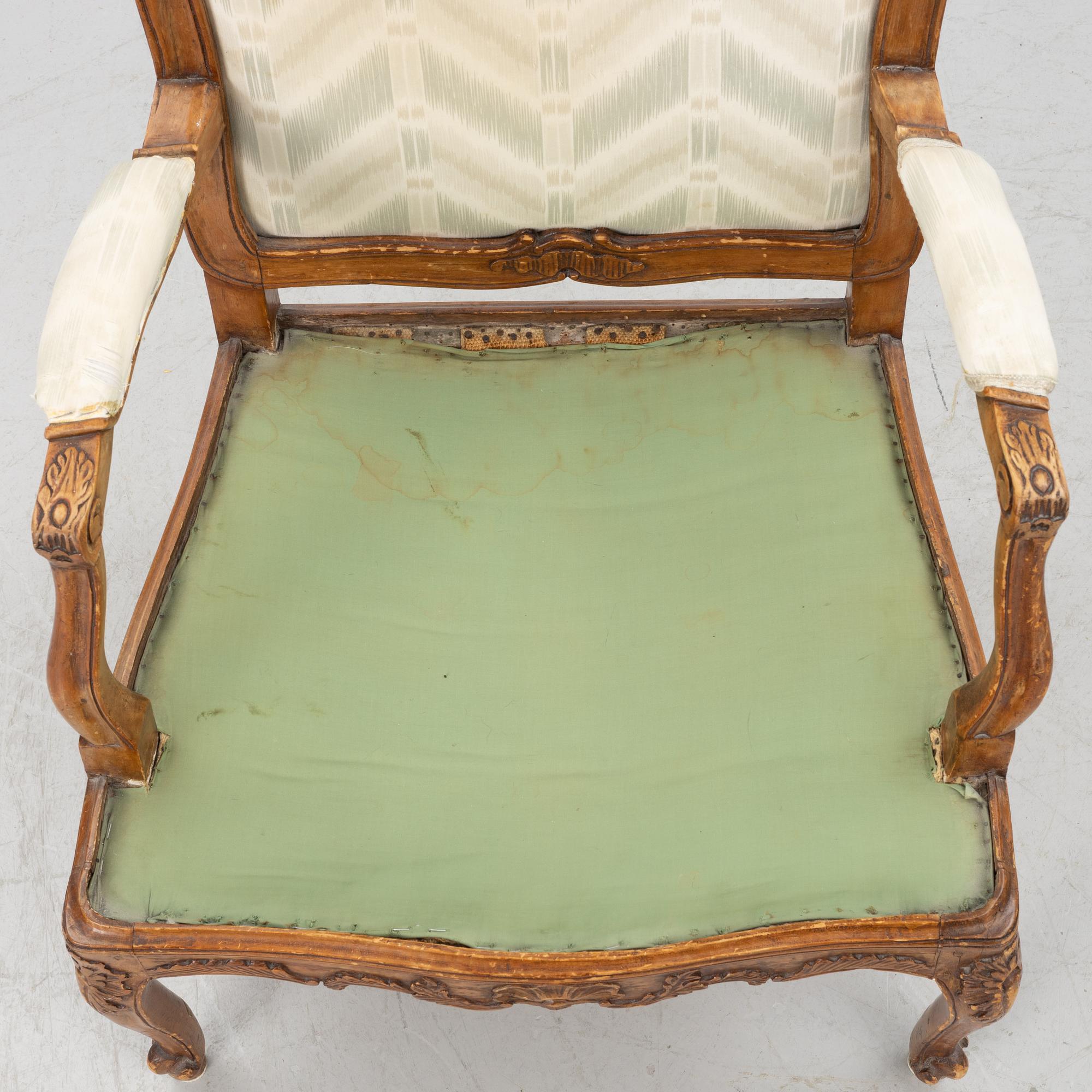 A pair of French Louis XV fauteuils, mid 18th century.