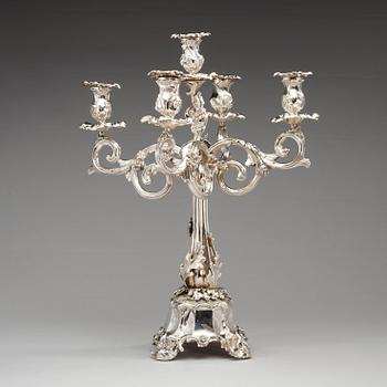 A pair of Swedish mid 19th century silver candelabra, marks of Gustaf Möllenborg-Féron, Stockholm 1856.