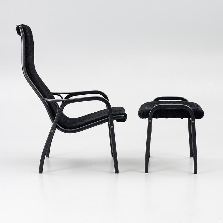 Yngve Ekström, a 'Lamino' easy chair with foot stool, Swedese 2010.