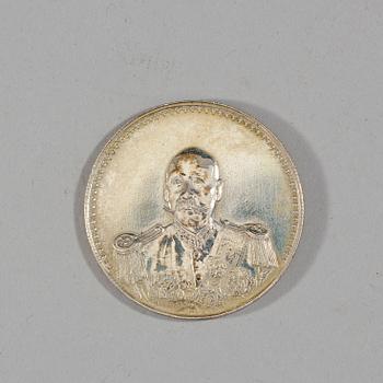 A box with five silver coins, Republic, early 20th Century.