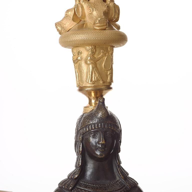 A pair of Russian Retour d'Egypte Empire Alexander I five-light candelabra, St. Petersburg.