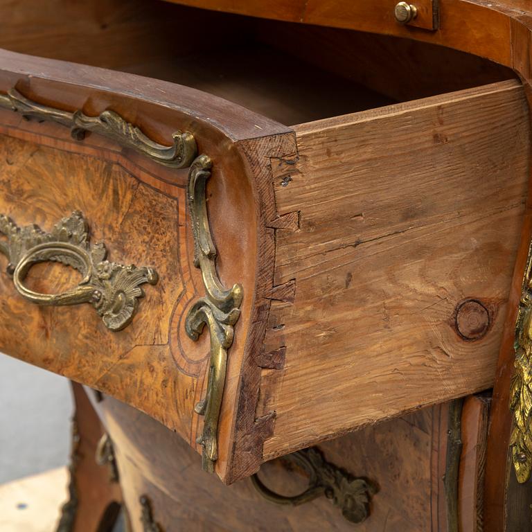 A 19th century rococo style secretaire.
