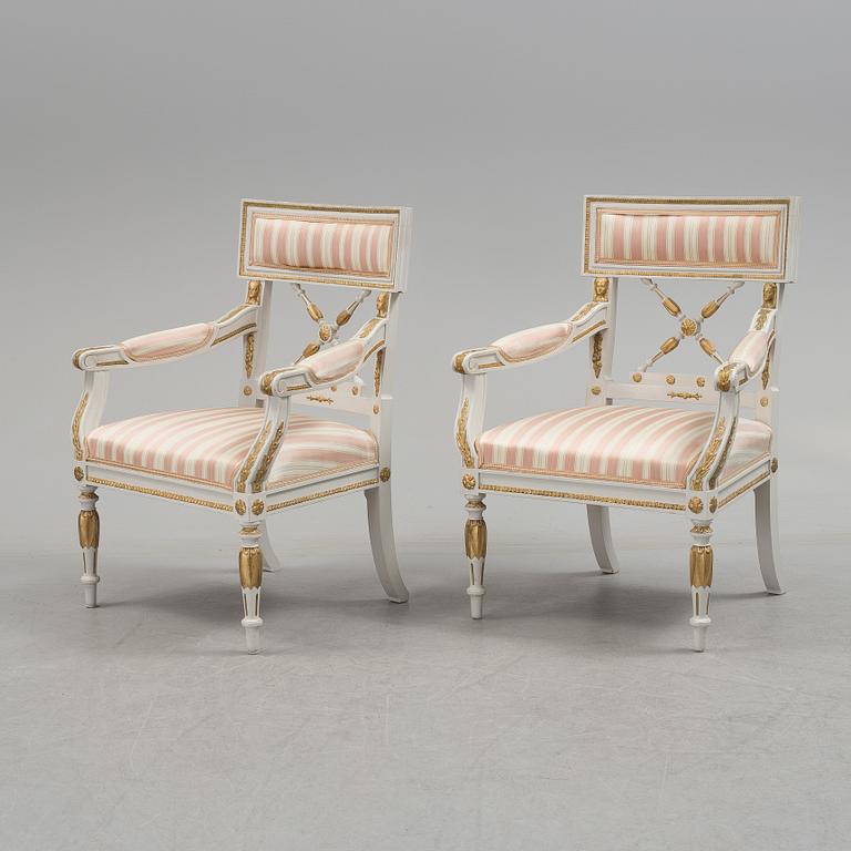 A set of two armchairs, a sofa, a stool and a chair. Early 20th century.