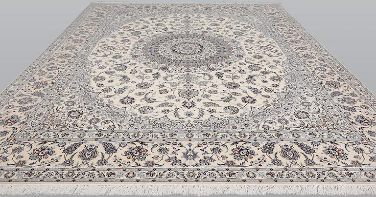A Nain part silk carpet, 408 x 308 cm.