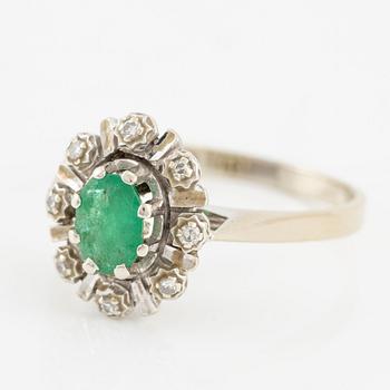 Ring, 18K white gold with emerald and small octagon-cut diamonds.