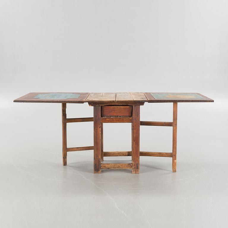 A mid 19th century gateleg table.