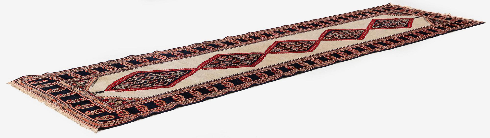 A semi-antique Northwest Persian (Iran) runner, c. 417 x 112 cm.