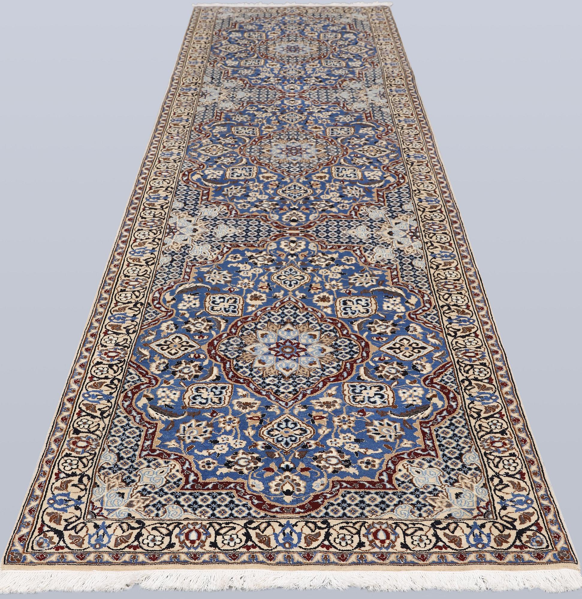 A carpet,  Nain, part silk, so-called 9 LAA, approx. 382 x 99 cm.