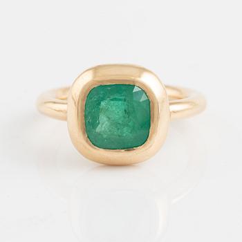 18K gold and cushion shaped emerald ring.
