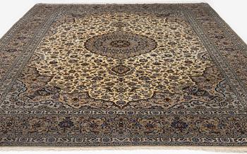 A semi-antique silk Keshan carpet, c. 350 x 248 cm.