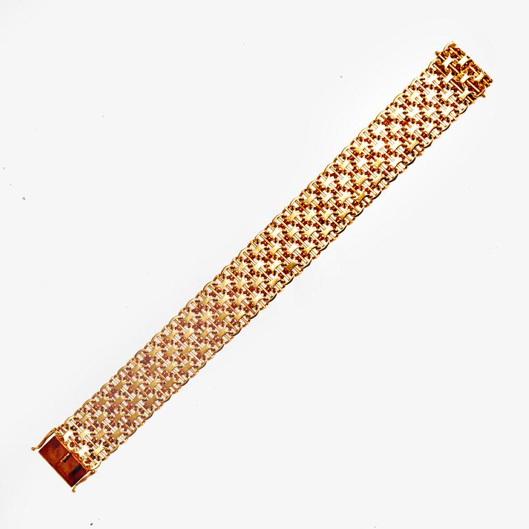 An 18K gold bracelet, 1975.