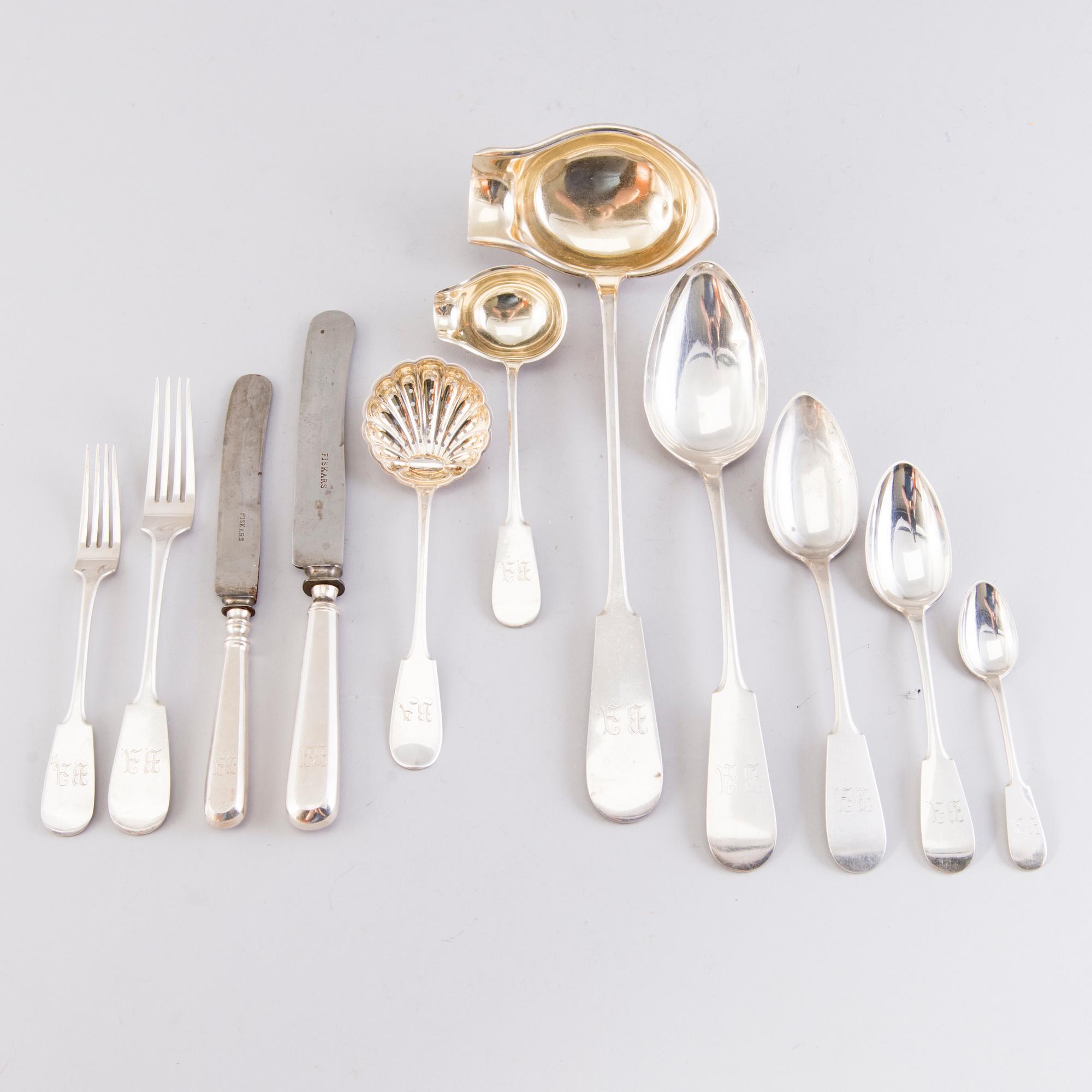 A 89-piece set of 'Helsinki' silver cutlery in wooden case, mark of Oskar Lindroos, Helsinki 1917-1925.