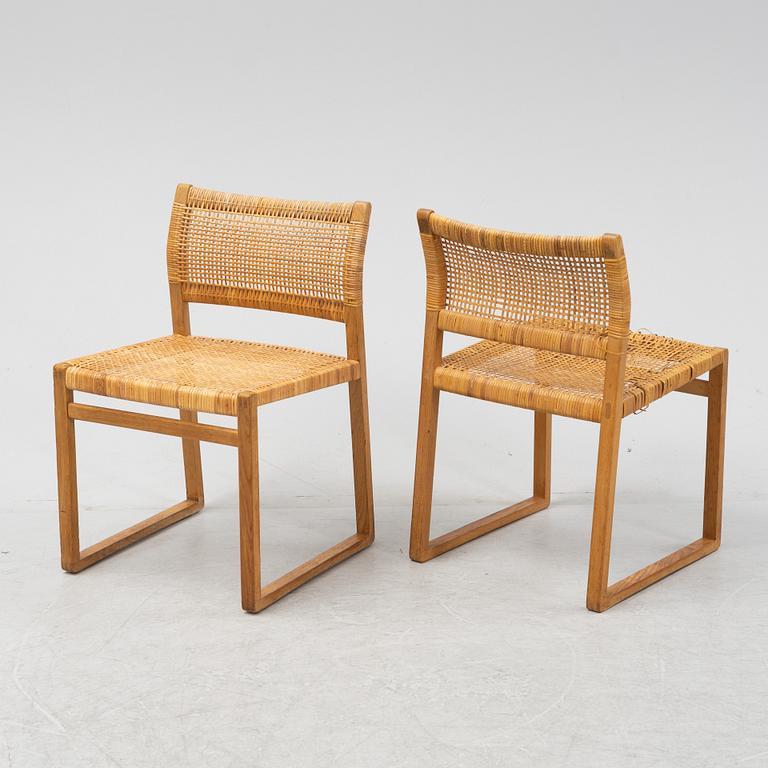 Børge Mogensen, four 'BM61' rattan and oak chairs.