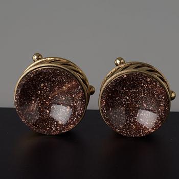 A pair of gilt silver and porphyry salts, by Gustaf Folcker, Stockholm 1827.