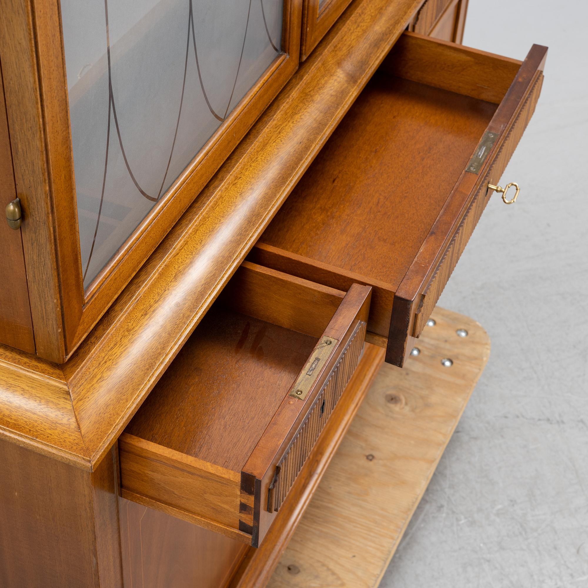 A mahogany veneered Swedish Modern display cabinet, 1940's/50's.