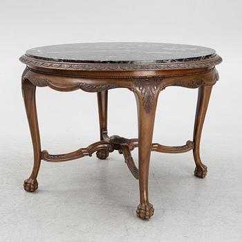 A Chippendale style dining table, first half of the 20th Century.