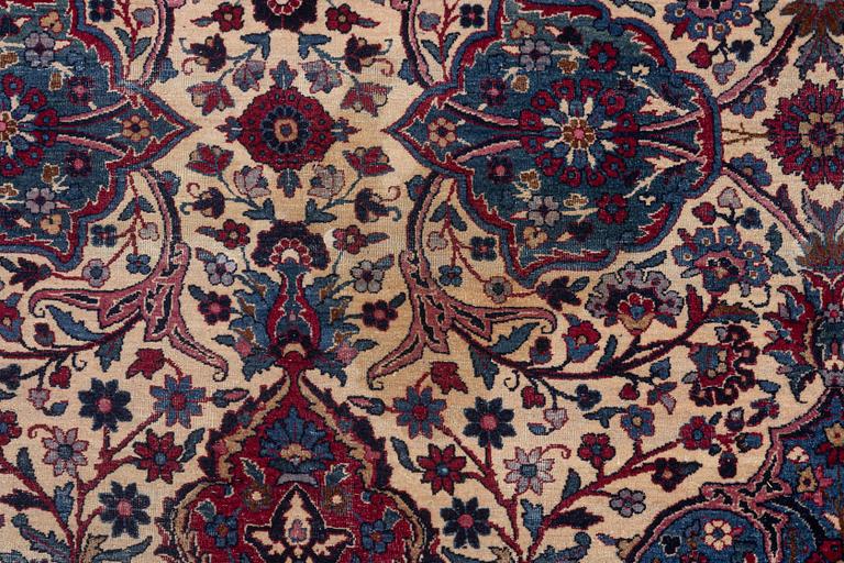 An oriental carpet, approx. 411 x 326 cm.