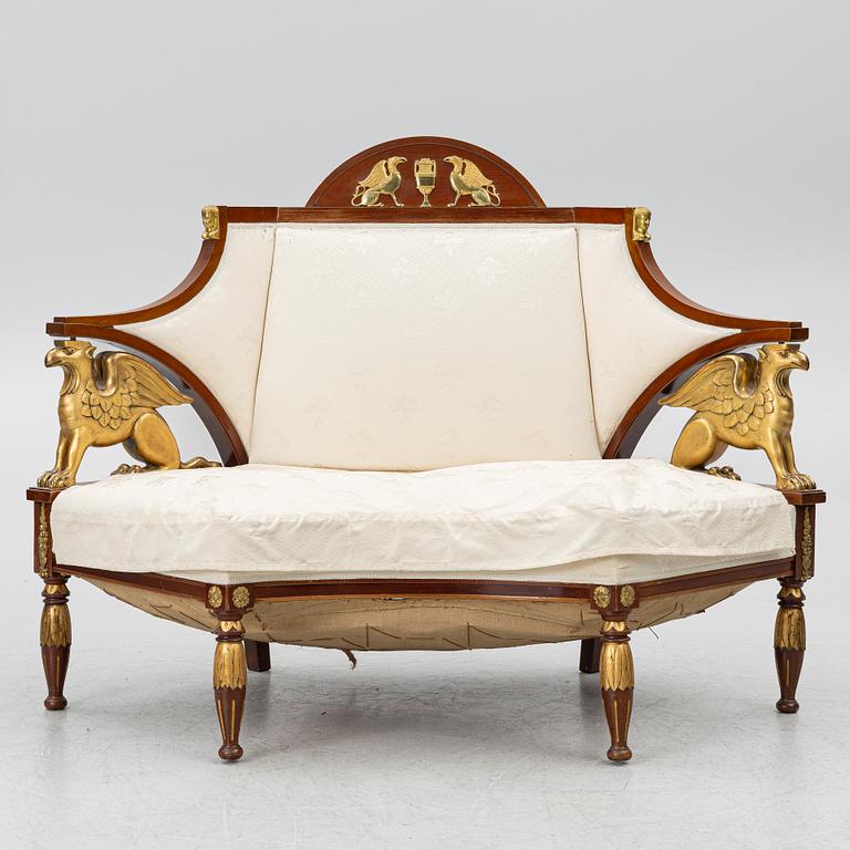 An Empire-style sofa, around 1900.