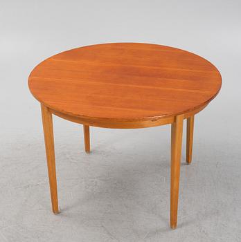 A dining table, 1950s/60s.