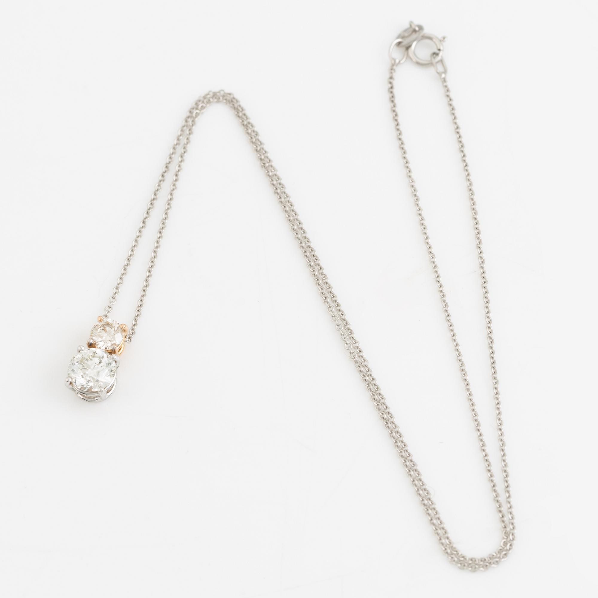 Collier med två briljantslipade diamanter. Medföljande GIA report.