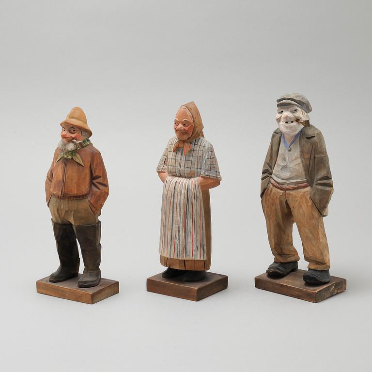 and CARL JOHAN TRYGG, three wooden sculptures, signed and dated, 1940s.