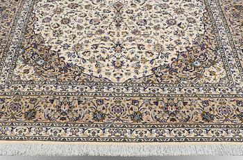 A Keshan carpet, approx. 354 x 254 cm.
