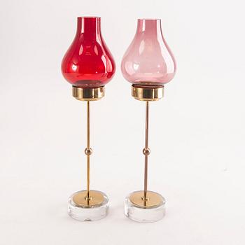 Gunnar Ander, a set of five different brass and glass candle sticks from Ystad Metall mid 1900s/second part.