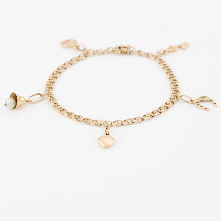 Armband, 18K guld med berlocker.