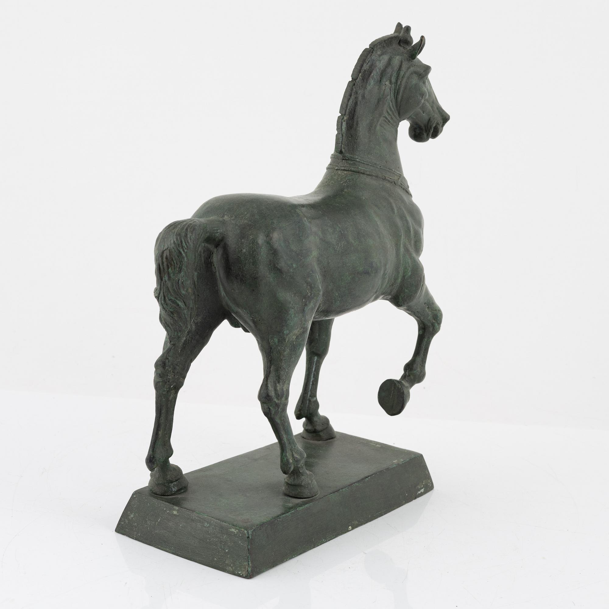 A patinated metal sculpture after the Horses of Saint Mark.