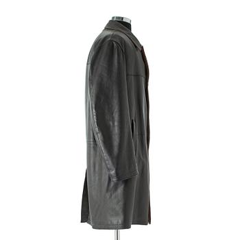 BURBERRY, a black leather overcoat.