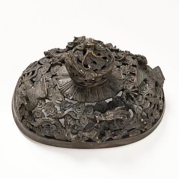 A bronze reticulated incense burner with cover, Qing dynasty (1644-1912).