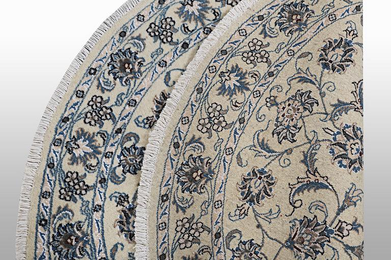 A rug, Nain, part silk, ca 316 x 136 cm.