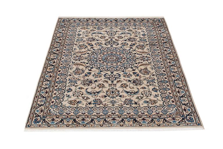 An old part silk Nain carpet ca 187 x 116 cm.