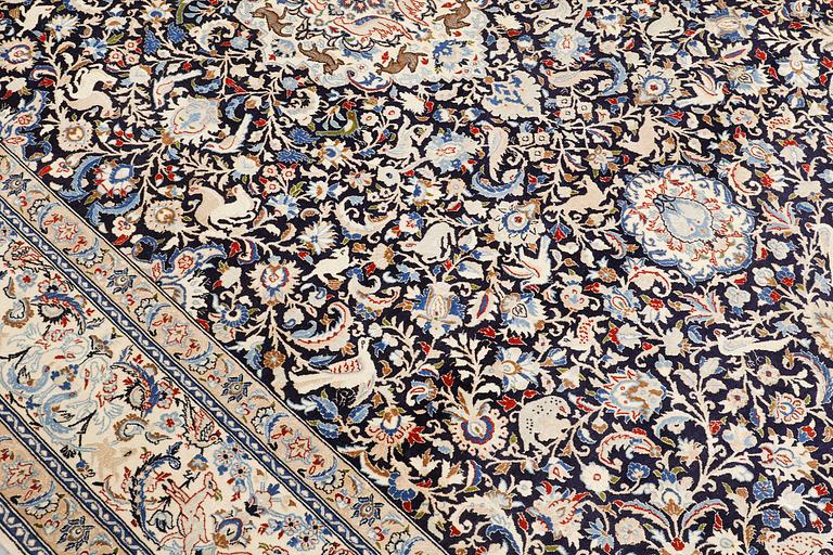 A Nain carpet, part silk, so-called 6 LAA, approx. 324 x 210 cm.