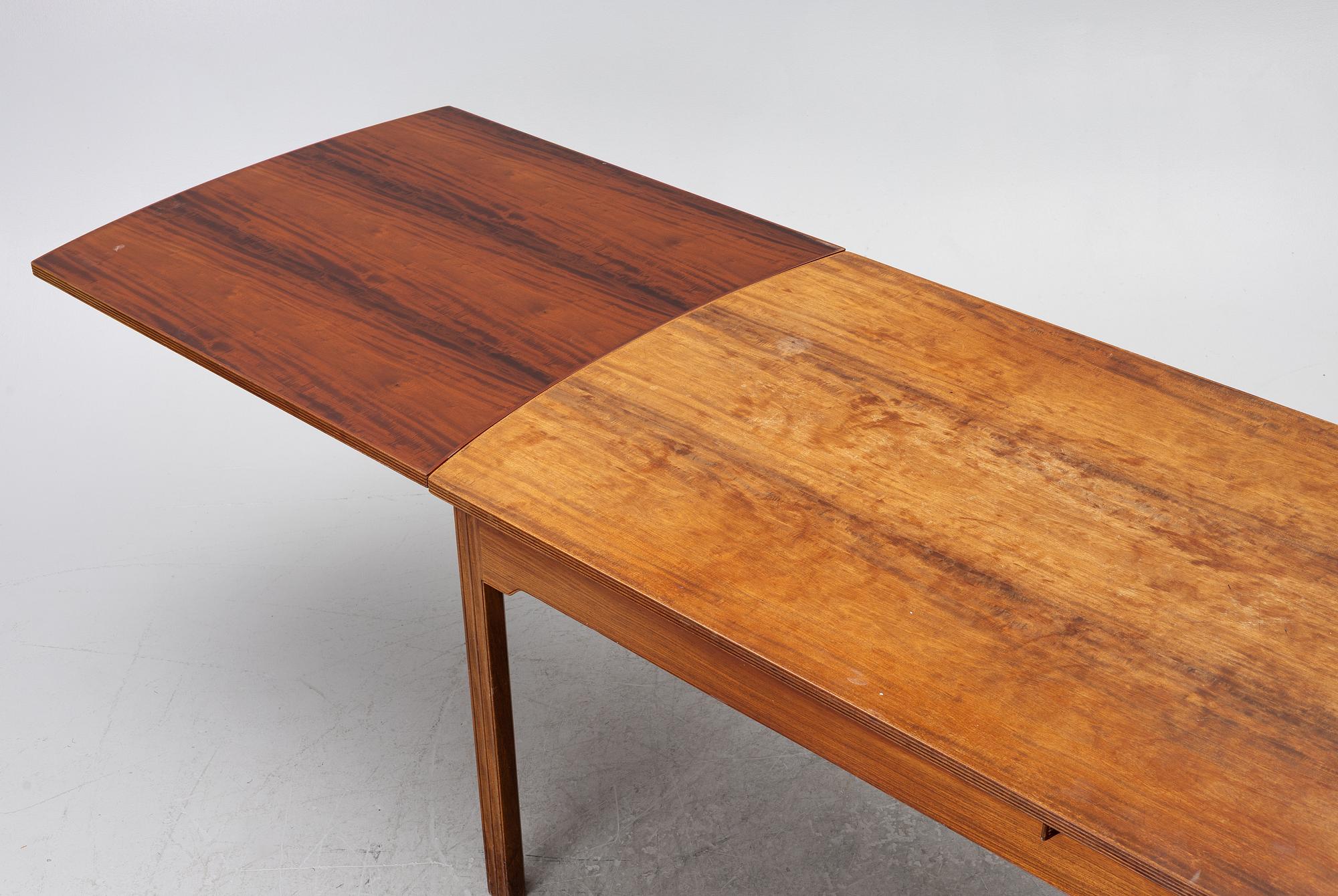 A Skandivanian dining table, 1950's/60's.