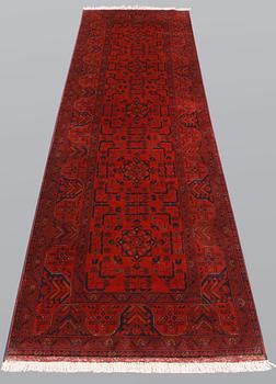 An Afghan runner, so called Khan Mohammadi, ca 297 x 78 cm.
