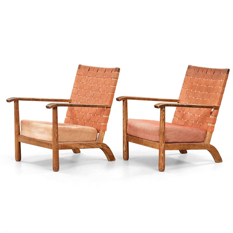 Axel Einar Hjorth, a pair of pine easy chairs, probably model 'Väddö' by Nordiska Kompaniet, Sweden 1930's.