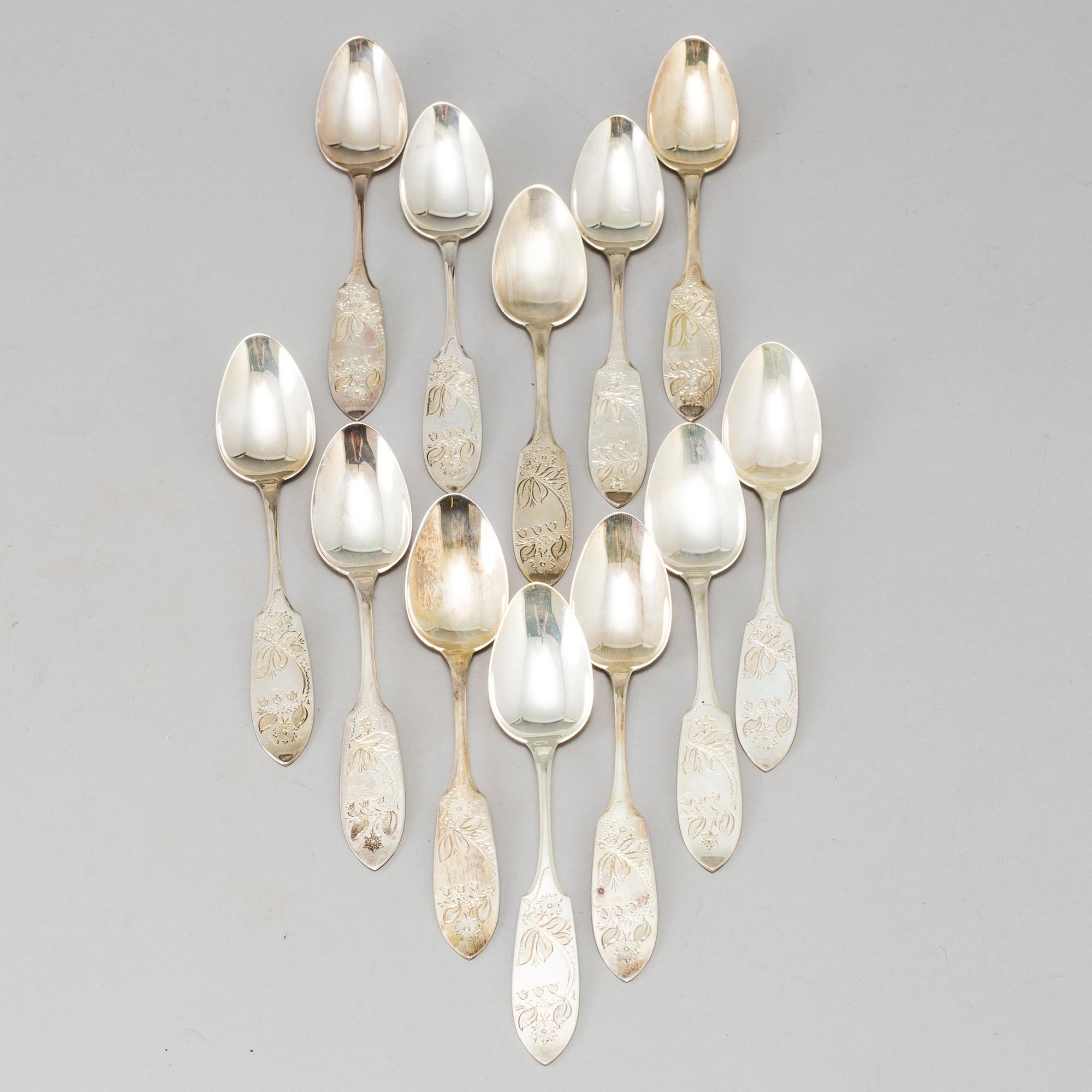 a lot of 24 silver spoons by C O Persson AB in Haparanda, Sweden. Weight ca 522 grams.