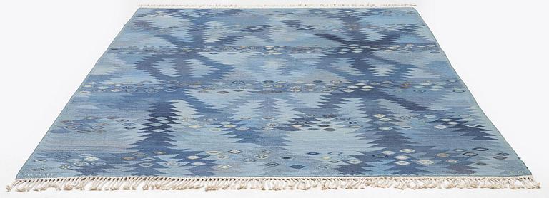 Barbro Nilsson, a carpet, 'Tånga mellanblå', flat weave, c. 350 x 252 cm, signed AB MMF BN.