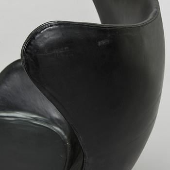 Arne Jacobsen, a black leather "Egg" armchair, Fritz Hansen, Denmark 1960/70s.