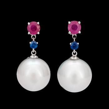 121. A pair of ruby, sapphire and cultured South sea pearl earrings.