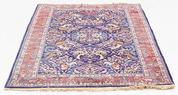 Rug, likely Tabriz, signed, approximately 212 x 145 cm.