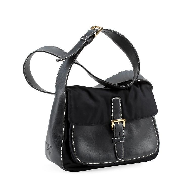 PRADA, a blue nylon and leather shoulder bag.