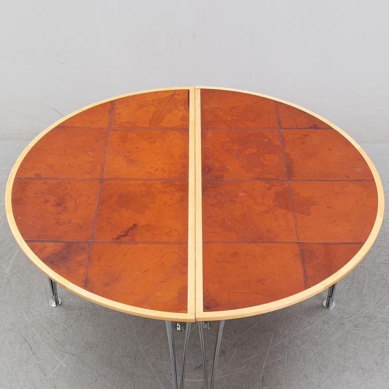 A birch and leather dining table in two parts, Mathsson International, 21th century.