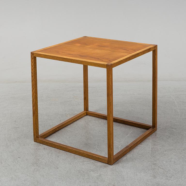 MARIO PRANDINA, an oak table and four chairs, Plinio Il Giovane, Italy.